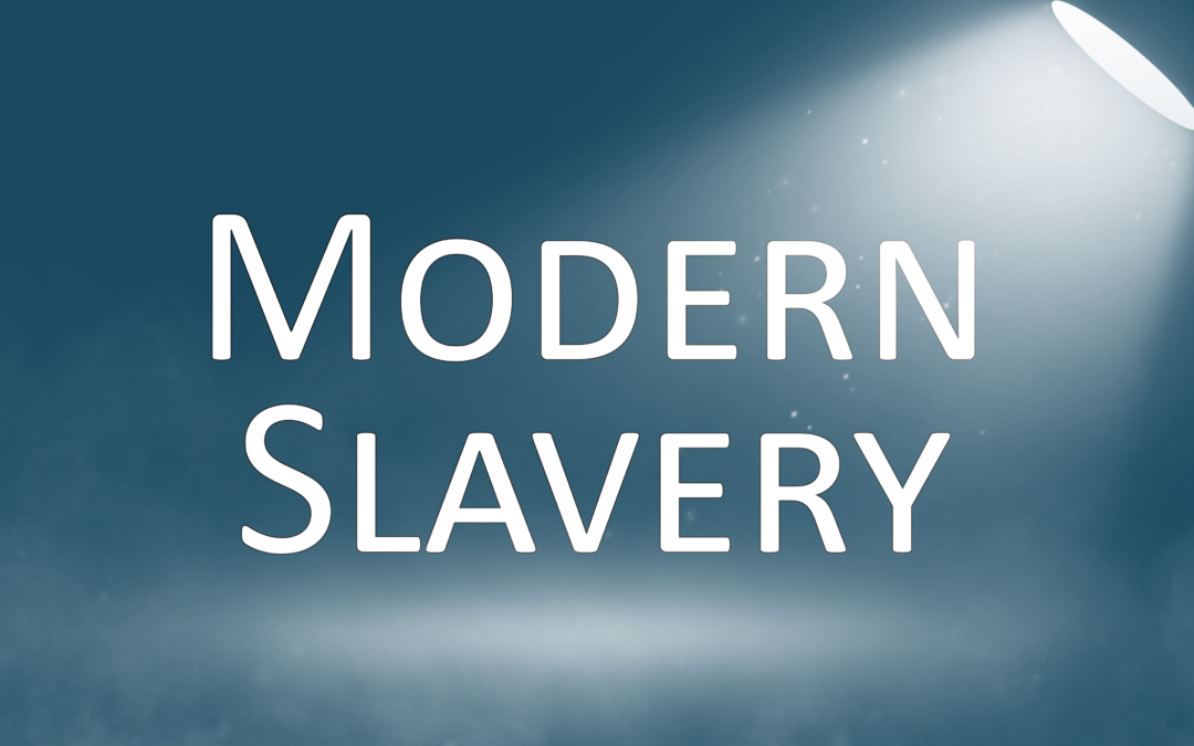 Graphic showing the words ‘Modern slavery’ under a spotlight