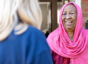 WWH Resident laughing with Housing Officer